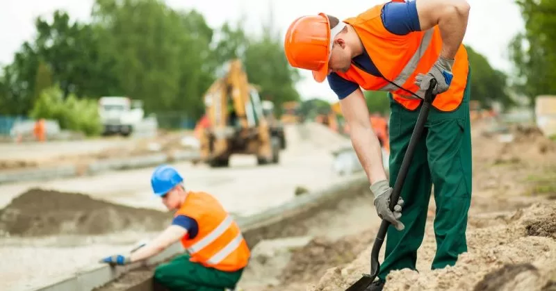 Road works, men digging